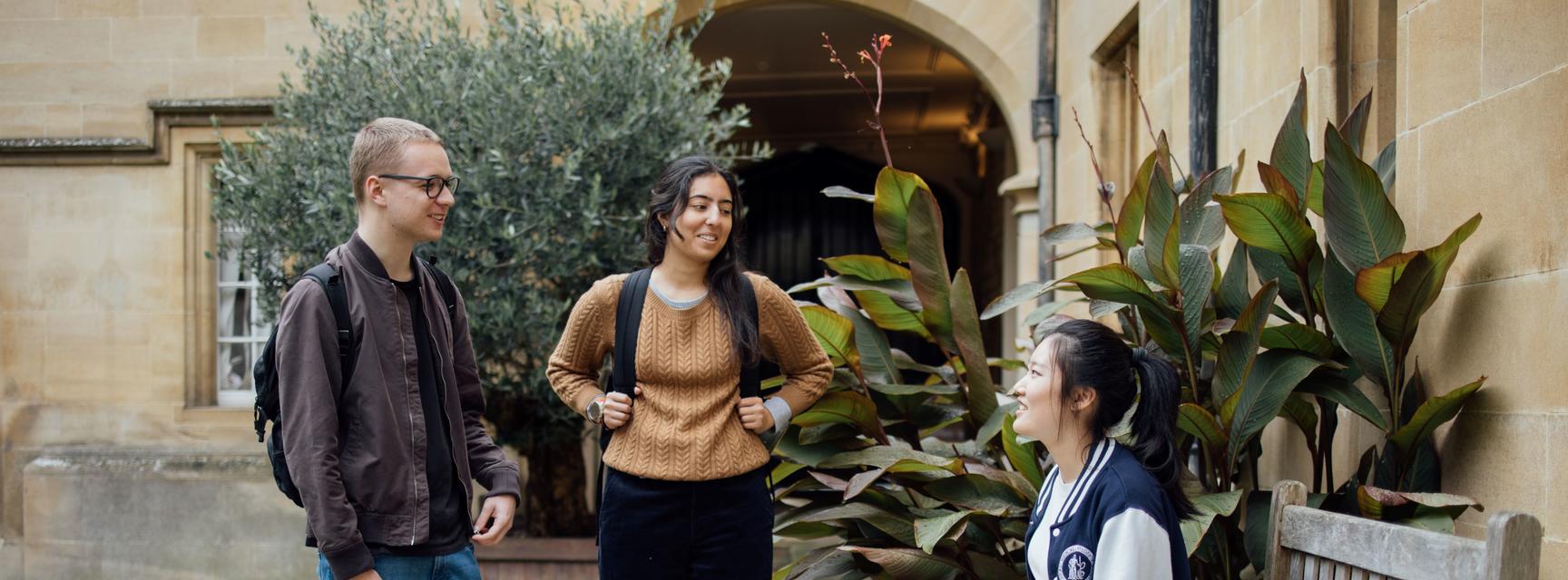 Three students talking